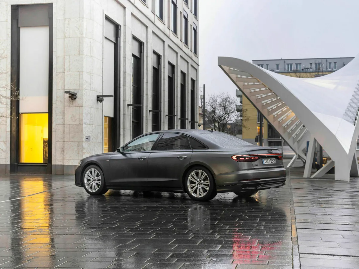 Audi A8 in front of a building
