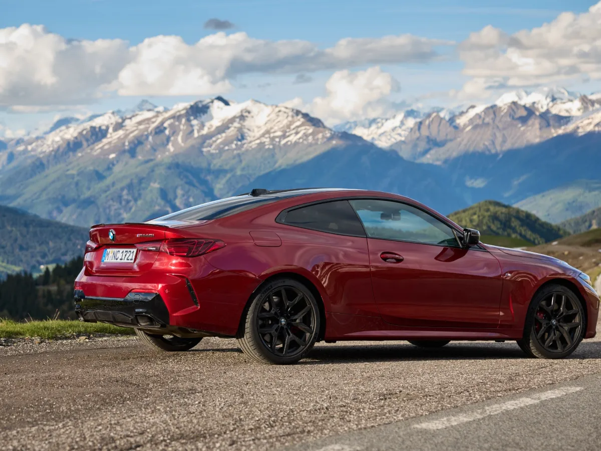 BMW 4 Series Coupé from the rear, in front of mountains