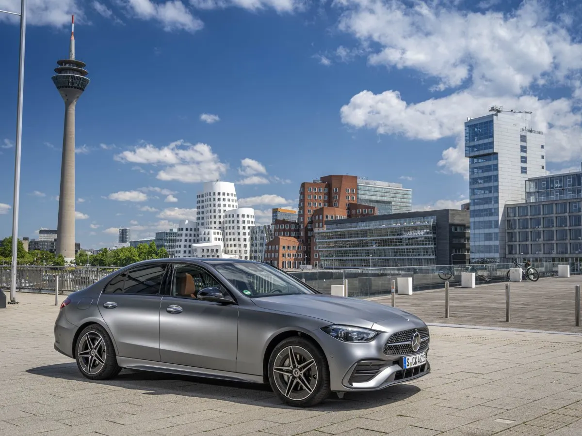 Mercedes-Benz C-Class in front of a modern building